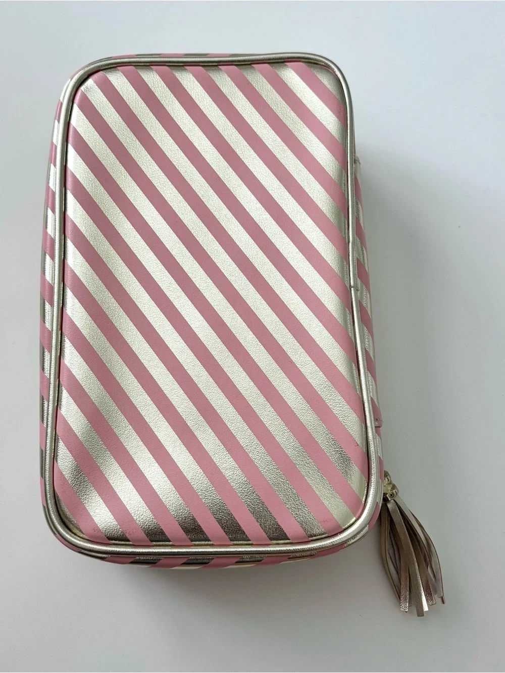 Too Faced pink and gold zip up makeup bag